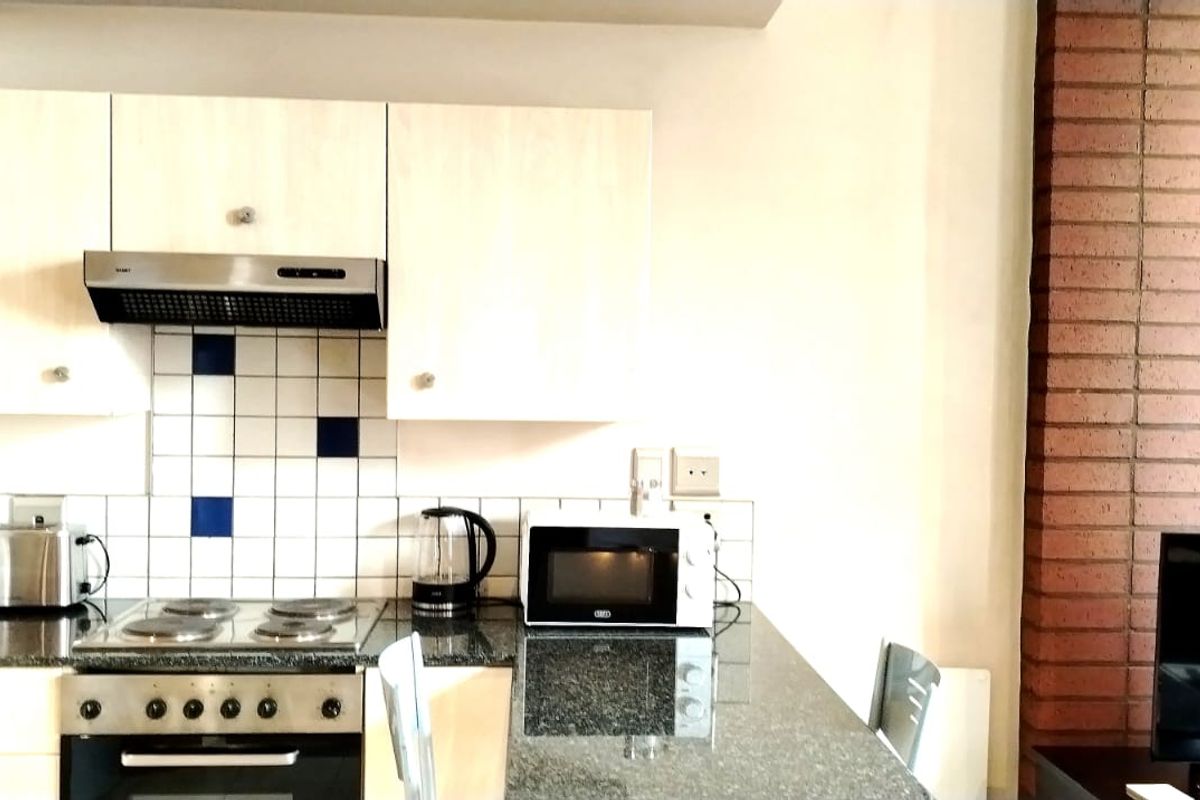 Spacious Fully Furnished Bachelor Apartment for sale in Mapungubwe Hotel Apartments, Marshalltown  - Photo 4