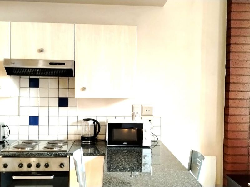 Spacious Fully Furnished Bachelor Apartment for sale in Mapungubwe Hotel Apartments, Marshalltown  - Photo 4