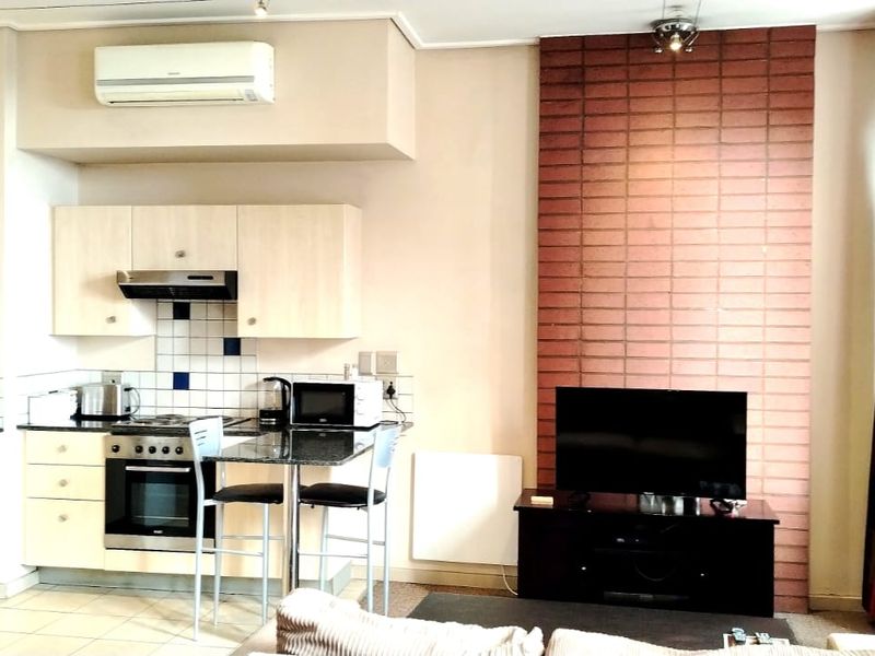 Spacious Fully Furnished Bachelor Apartment for sale in Mapungubwe Hotel Apartments, Marshalltown  - Photo 7