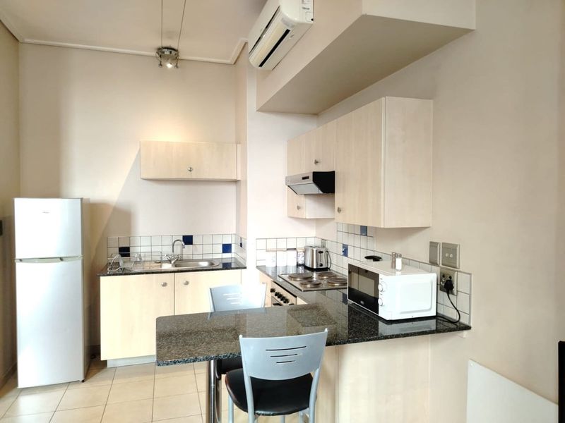 Spacious Fully Furnished Bachelor Apartment for sale in Mapungubwe Hotel Apartments, Marshalltown  - Photo 6