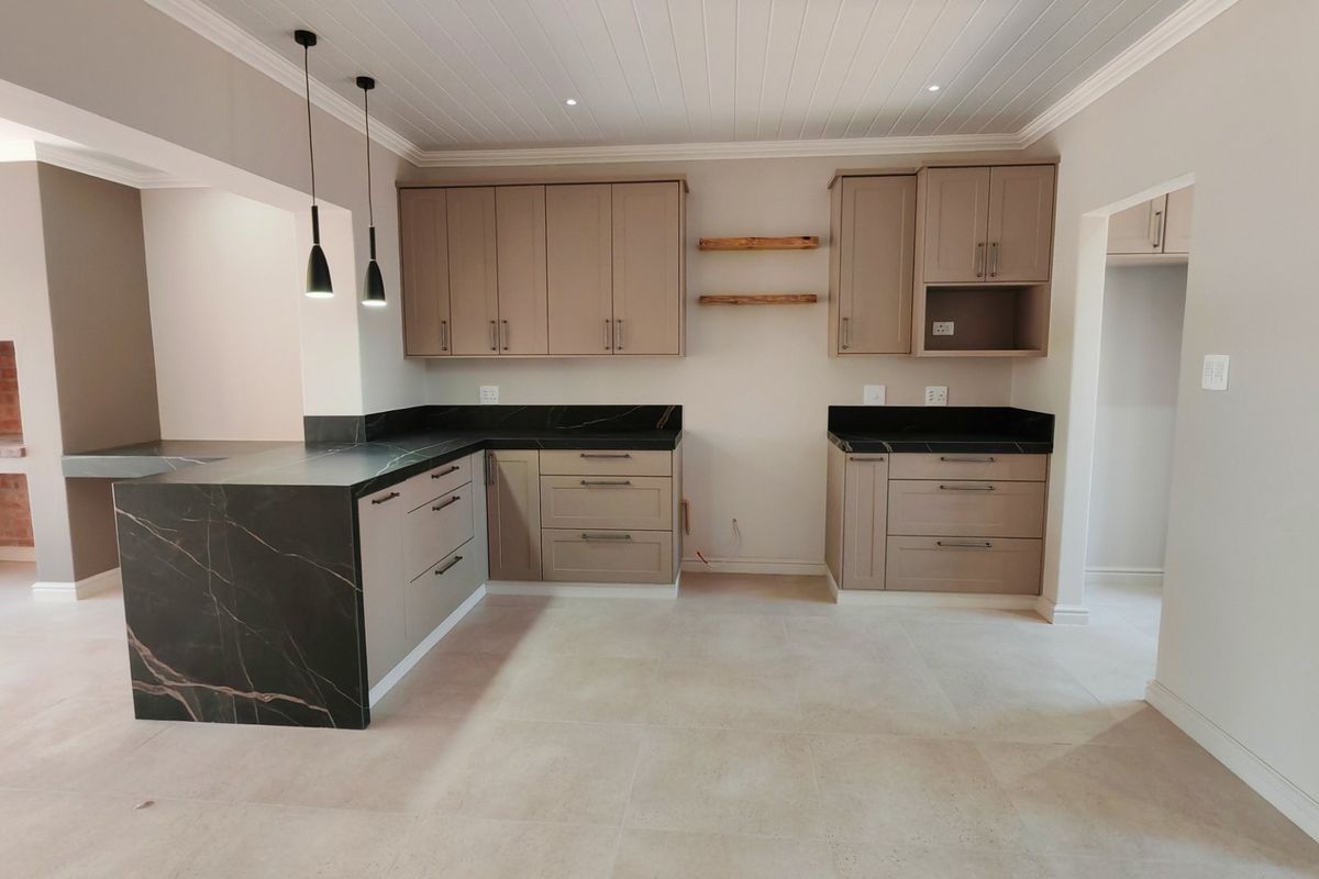 Elegant Renovated Coastal Home with Stylish Modern Finishes - Photo 5