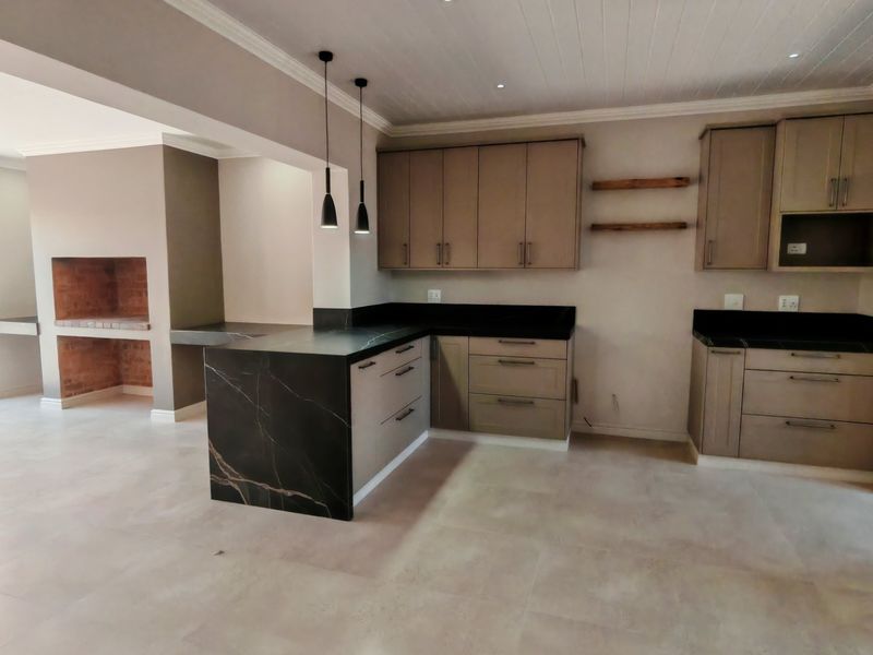 Elegant Renovated Coastal Home with Stylish Modern Finishes - Photo 6