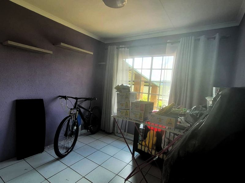 Townhouse with Garage & Private Garden in Rangeview - Photo 10