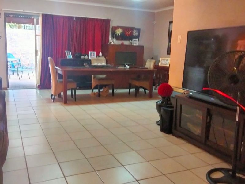 Spacious Family Home with Entertainment Haven & Income Potential! - Photo 10