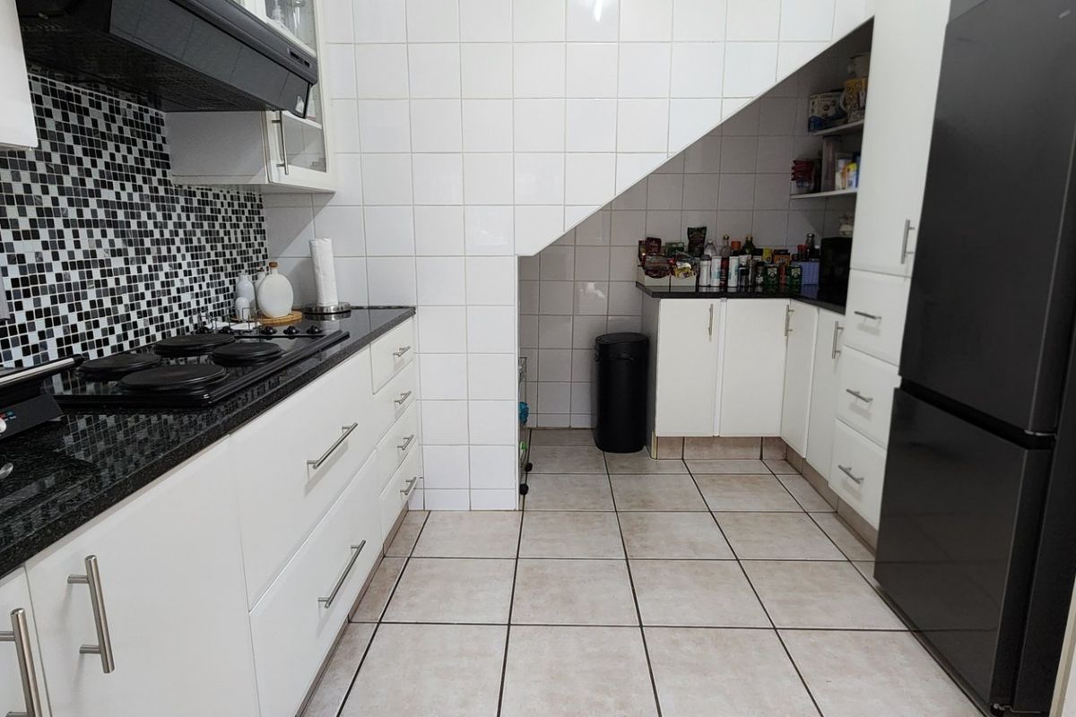 Elegant, Secure Family Living with Modern Comforts and Exceptional Convenience - Photo 4