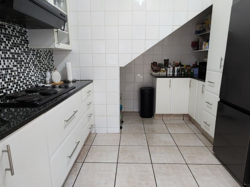 Elegant, Secure Family Living with Modern Comforts and Exceptional Convenience - Photo 4