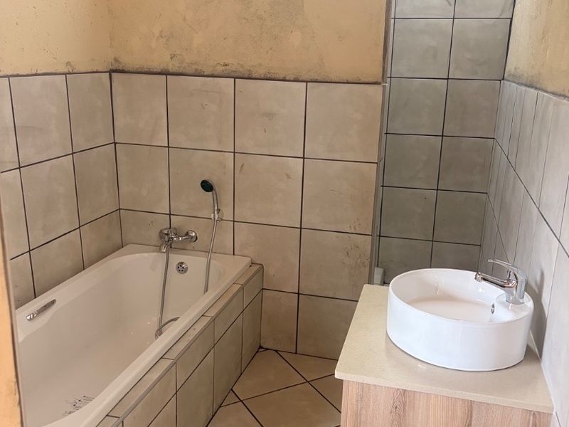 Newly Renovated 2 Bedroom Home To Rent – Safe, Secure & Pet Friendly This beautiful newly renovated 2-bedroom home offers modern, comfortable living in a safe and secure environment – perfect for a professional couple, small family with older children, or anyone looking for a neat lock-up-and-go lifestyle. Property Features: 	•	2 Spacious Bedrooms 	•	3 Bathrooms 	•	Small Study Area 	•	Newly Renovated Interior 	•	Safe & Secure Property 	•	Pet Friendly – maximum 2 small dogs allowed 	•	Prepaid Water 	•	Prepaid Electricity  Important Rental Conditions: 	•	No children under 12 years old 	•	Maximum of 2 small dogs only  This home offers the perfect balance of comfort, convenience, and peace of mind, with practical features and a fresh modern feel throughout.  ?? Ideal for tenants looking for a secure, neat, and move-in-ready home.  Contact us today to arrange a viewing!  Newly Renovated 2 Bedroom House To Rent  Beautiful newly renovated 2-bedroom, 2-bathroom home available to rent in a safe and secure area. The property offers a small office/study space, perfect for working from home. Pet friendly for a maximum of 2 small dogs. Prepaid water and prepaid electricity for easy budgeting.  Please note: 	•	No children under 12 	•	Maximum 2 small dogs only  A neat, modern, and move-in-ready home - Photo 6