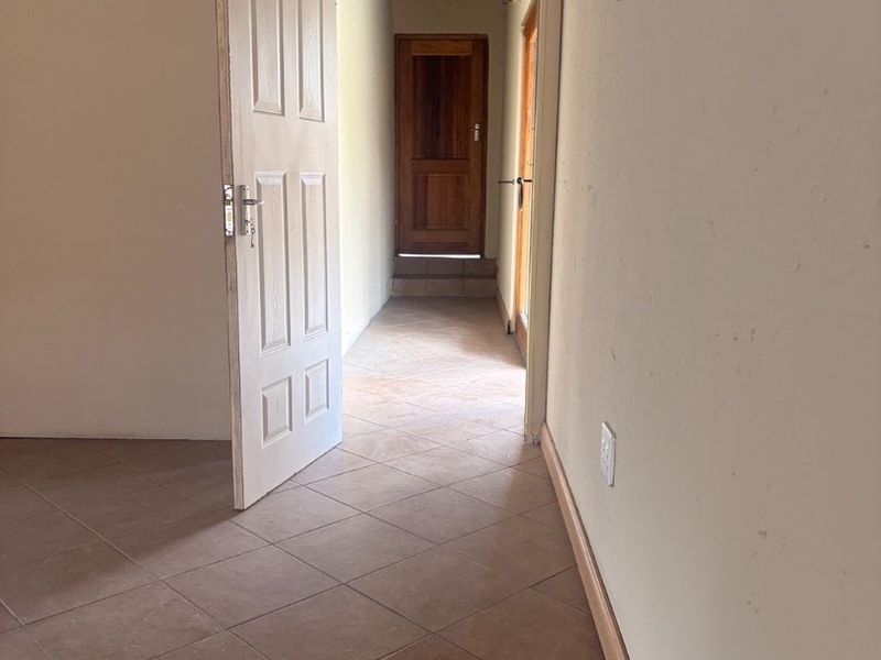 Newly Renovated 2 Bedroom Home To Rent – Safe, Secure & Pet Friendly This beautiful newly renovated 2-bedroom home offers modern, comfortable living in a safe and secure environment – perfect for a professional couple, small family with older children, or anyone looking for a neat lock-up-and-go lifestyle. Property Features: 	•	2 Spacious Bedrooms 	•	3 Bathrooms 	•	Small Study Area 	•	Newly Renovated Interior 	•	Safe & Secure Property 	•	Pet Friendly – maximum 2 small dogs allowed 	•	Prepaid Water 	•	Prepaid Electricity  Important Rental Conditions: 	•	No children under 12 years old 	•	Maximum of 2 small dogs only  This home offers the perfect balance of comfort, convenience, and peace of mind, with practical features and a fresh modern feel throughout.  ?? Ideal for tenants looking for a secure, neat, and move-in-ready home.  Contact us today to arrange a viewing!  Newly Renovated 2 Bedroom House To Rent  Beautiful newly renovated 2-bedroom, 2-bathroom home available to rent in a safe and secure area. The property offers a small office/study space, perfect for working from home. Pet friendly for a maximum of 2 small dogs. Prepaid water and prepaid electricity for easy budgeting.  Please note: 	•	No children under 12 	•	Maximum 2 small dogs only  A neat, modern, and move-in-ready home - Photo 4