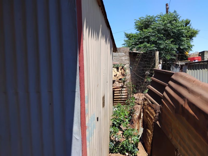 VACANT STAND FOR SALE WITH A SHACKS LOCATED IN TEMBISA, DUDUZA SECTION - Photo 4