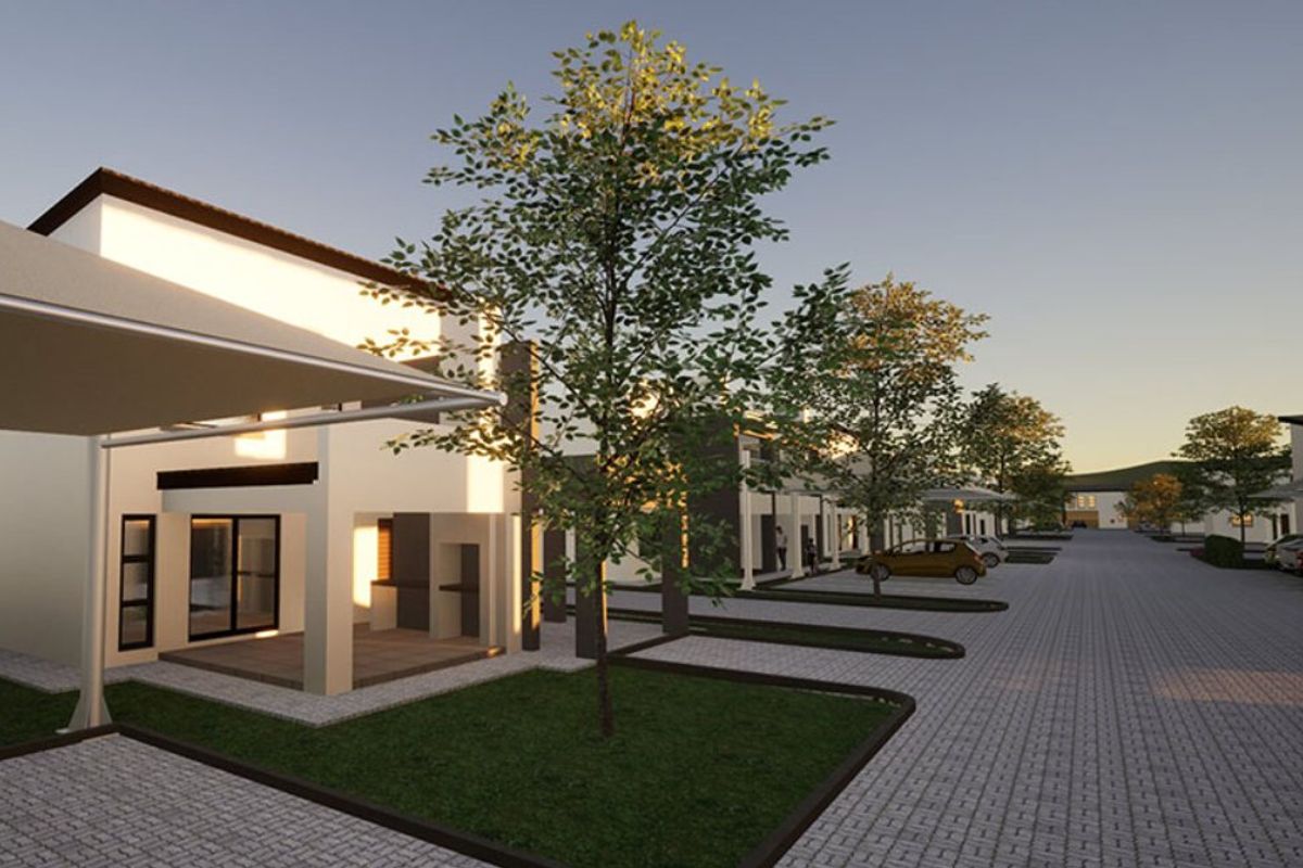 A digital rendering of a modern townhouse complex featuring paved driveways, covered parking, landscaped garden areas, and contemporary building facades.