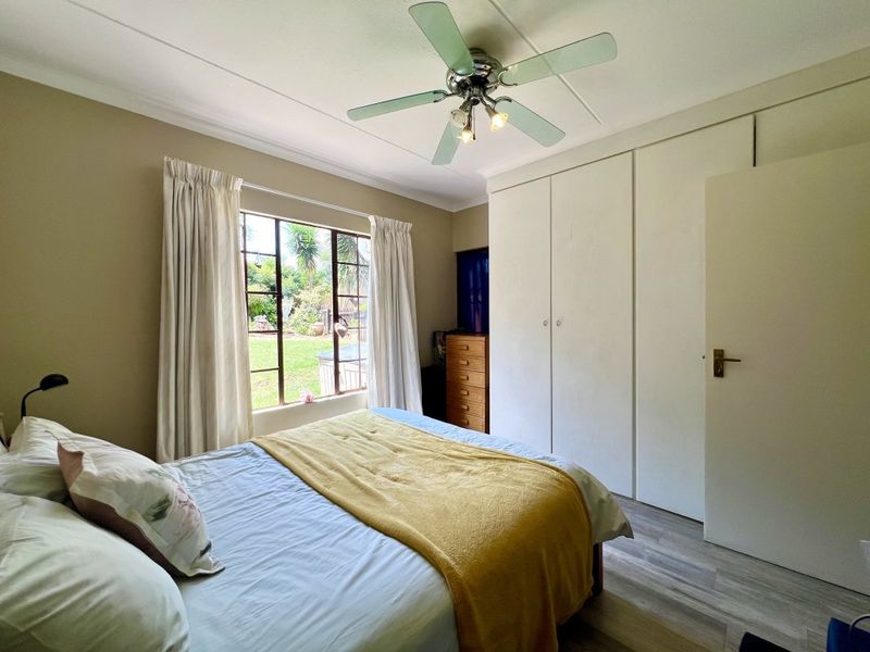 Spacious 2-Bedroom Simplex with Garden & Pool! - Photo 5