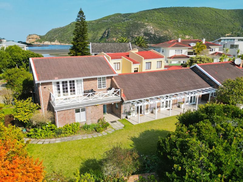 An expansive property steps away from the Knysna Estuary! - Photo 1