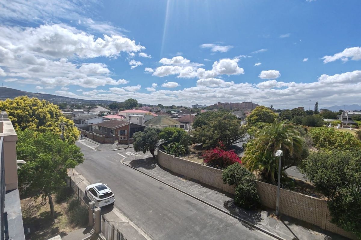 An elevated outdoor view overlooking the surrounding neighbourhood streets, residential properties, and landscaped greenery.