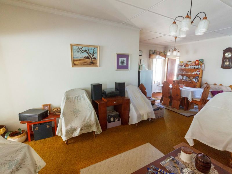 Charming Family Home in Mindalore – Spacious Living with a Lush Garden Retreat - Photo 8