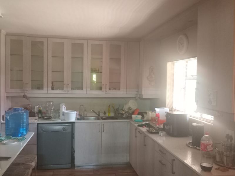 Imagine stepping onto warm floors on a cold morning, coffee in your marble kitchen... this home was designed for living well. - Photo 9