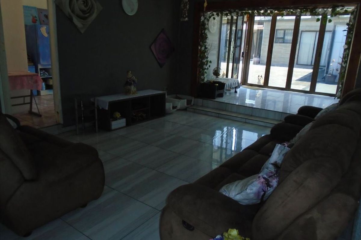 Elegant Family Home with Granny Flat and Extensive Parking - Photo 2