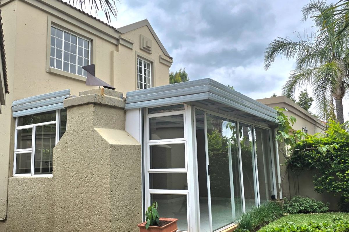 BEAUTIFUL DUPLEX IN WELL MAINTAINED COMPLEX - Photo 2