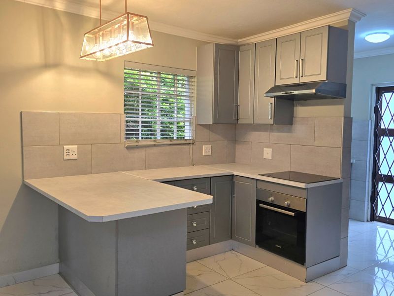 BEAUTIFUL DUPLEX IN WELL MAINTAINED COMPLEX - Photo 4