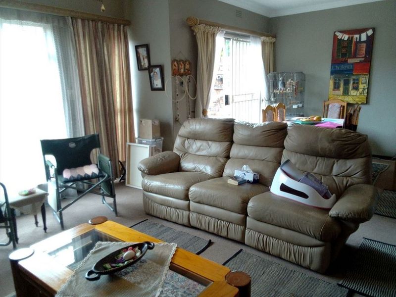 Neat and Functional Home with Secure Parking - Photo 1