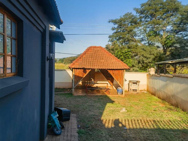 This charming 3-bedroom house is perfect for first-time home buyers or as an investment opportunity! - Photo 2