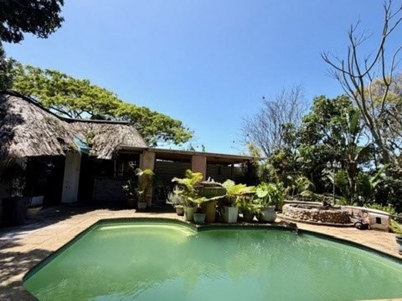 Tropical Coastal Retreat with Ocean Views – Your Dream Family Home Awaits - Photo 10