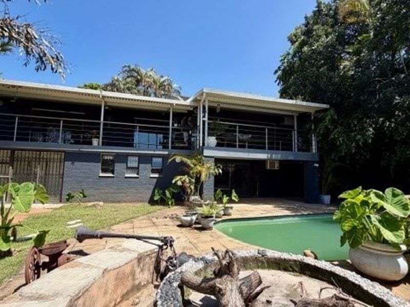 Tropical Coastal Retreat with Ocean Views – Your Dream Family Home Awaits - Photo 1