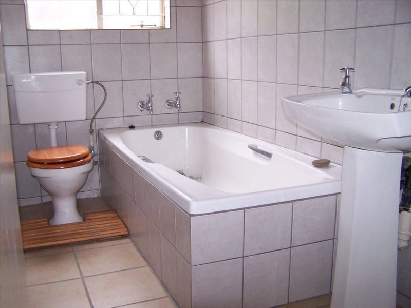 Cozy 2-Bedroom Home with Practical Living Spaces - Photo 10