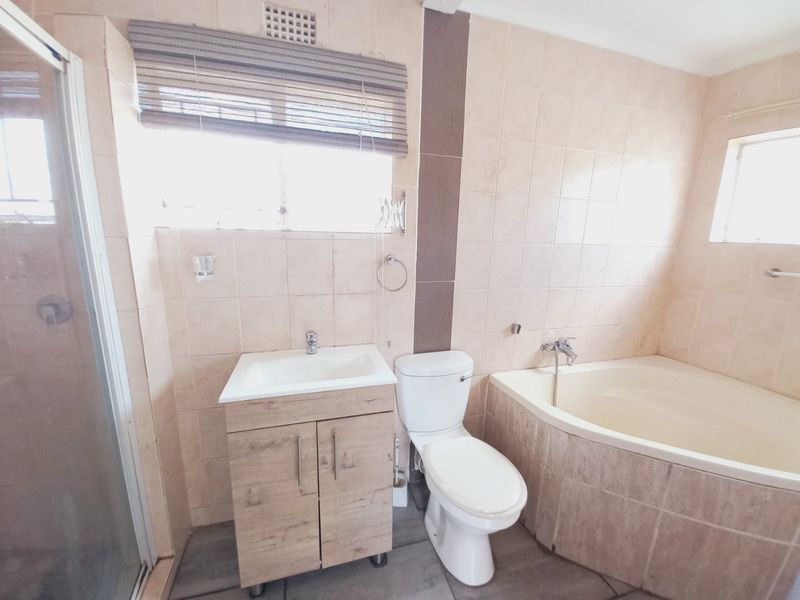 Bright open plan garden cottage with braai corner - Photo 10