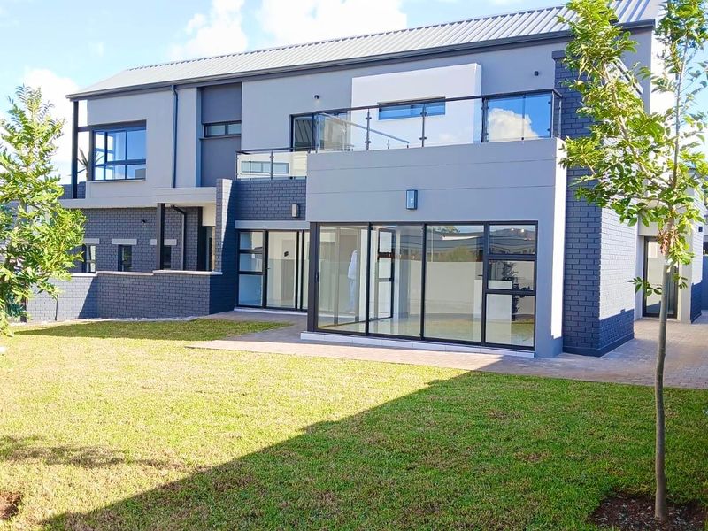 Contemporary 4 Bedroom Family Home | Double Garage | No Transfer Duty | Move-In Ready - Photo 4