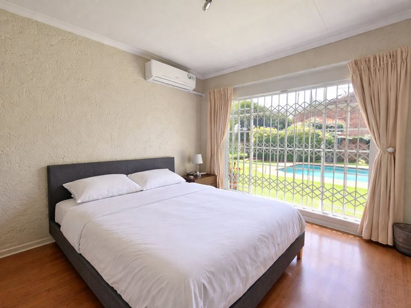 Spacious 3-Bedroom Home with Two Income-Generating Flats in East Village - Photo 7