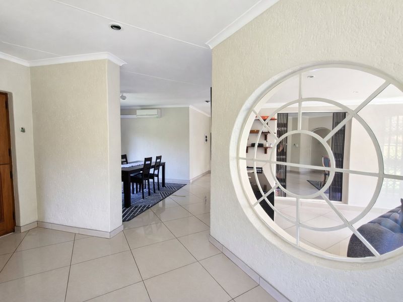 Spacious 3-Bedroom Home with Two Income-Generating Flats in East Village - Photo 5