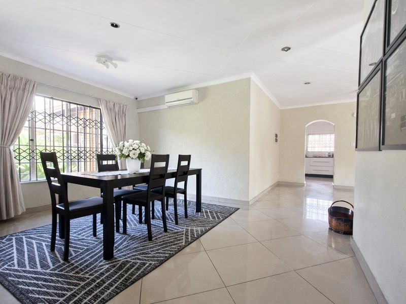 Spacious 3-Bedroom Home with Two Income-Generating Flats in East Village - Photo 4