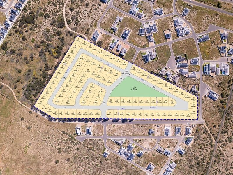 An aerial view showing the layout and subdivision of a residential land development project with multiple plots and internal road access.