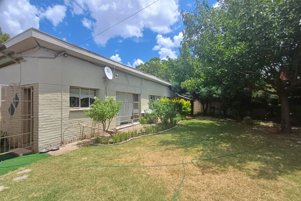 Elegant Family Haven with Income Potential in Sought-After Wilkoppies - Photo 4