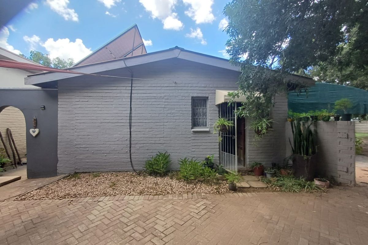 Elegant Family Haven with Income Potential in Sought-After Wilkoppies - Photo 3