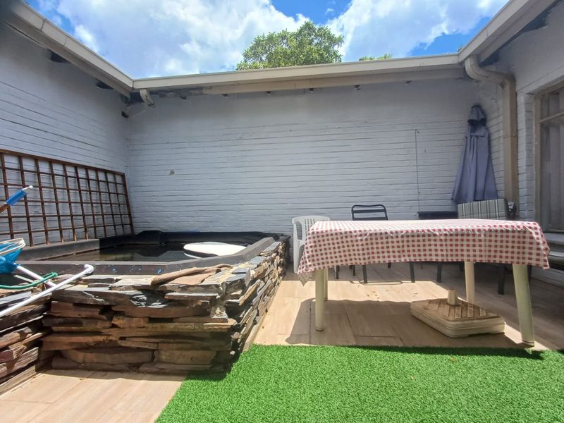 Elegant Family Haven with Income Potential in Sought-After Wilkoppies - Photo 6