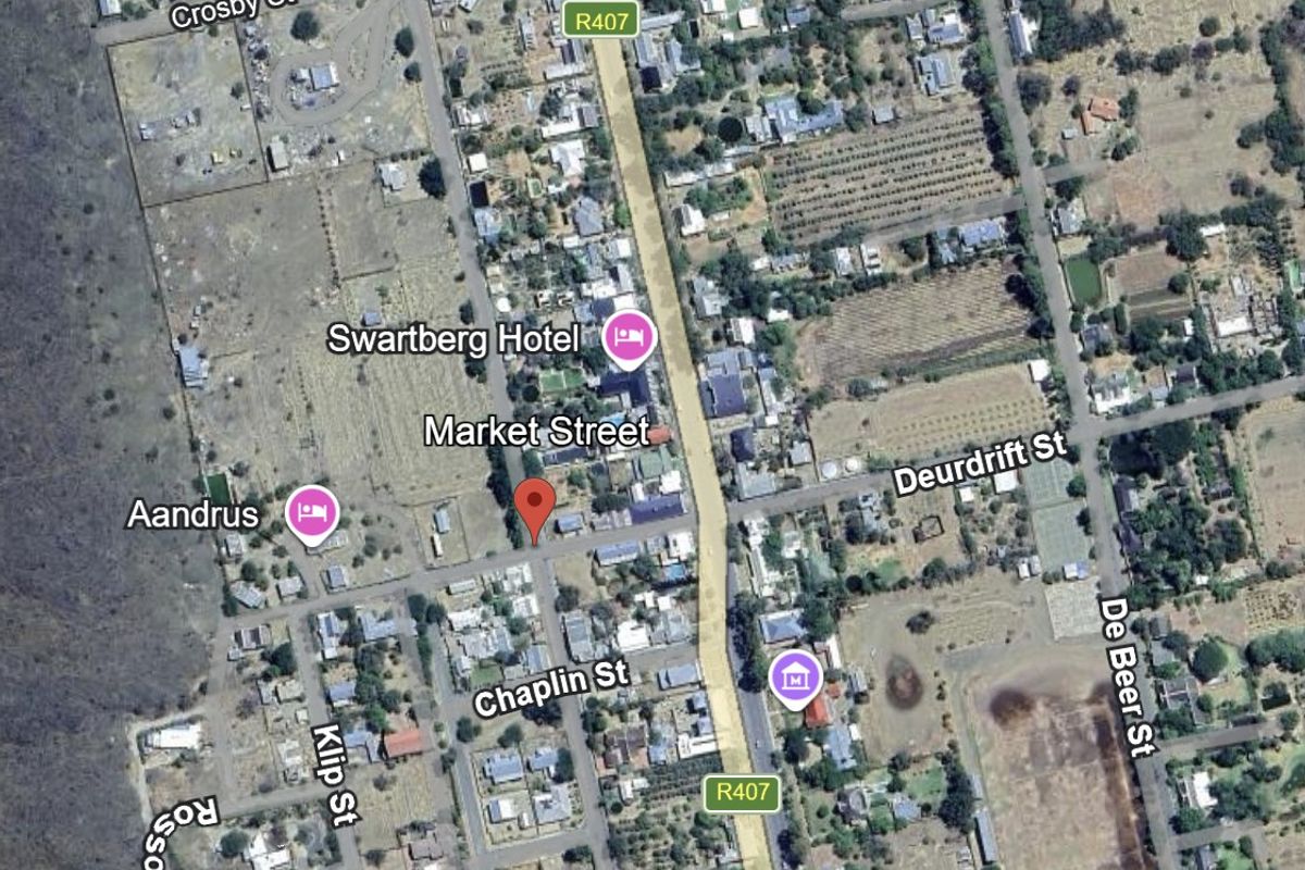 An aerial satellite view showing the residential street layout and surrounding neighborhood context of the property location.