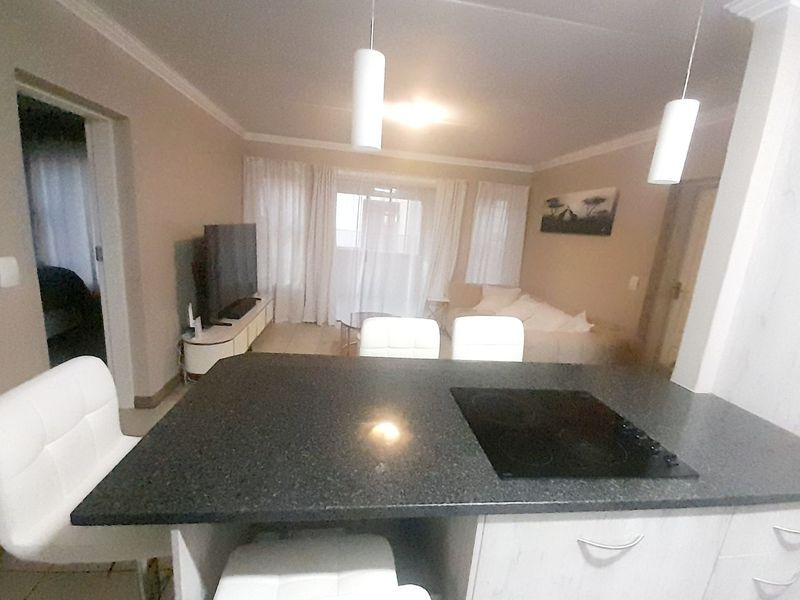 Modern 2-Bedroom Apartment with Dual En-Suites, Secure Estate Living - Photo 9