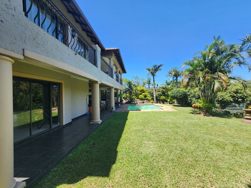 La Lucia Gardens Estate - Stunning, freestanding home within a sought after gated community and such an easy location - ideal family home - Photo 2