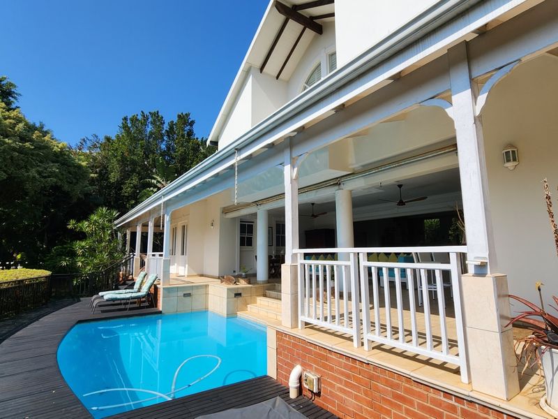 Luxurious 4 bed Home with Pool in Mount Edgecombe Golf Estate - EXCELLENT address - Photo 4