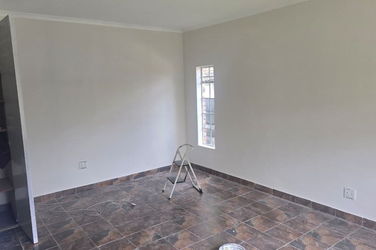 NEWLY RENOVATED AND FRESHLY PAINTED - Photo 4