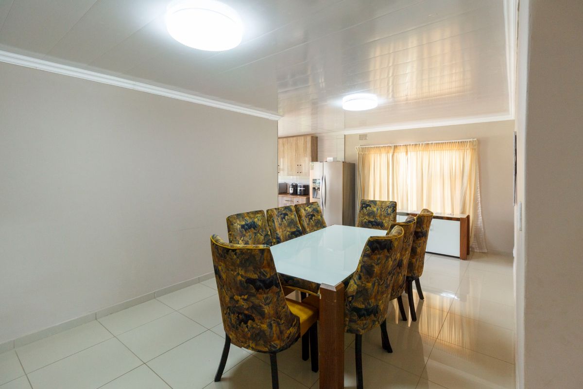 Welcoming Family Home with Beautiful Patio at 21 Jan van Rooyen Street, Mindalore - Photo 5