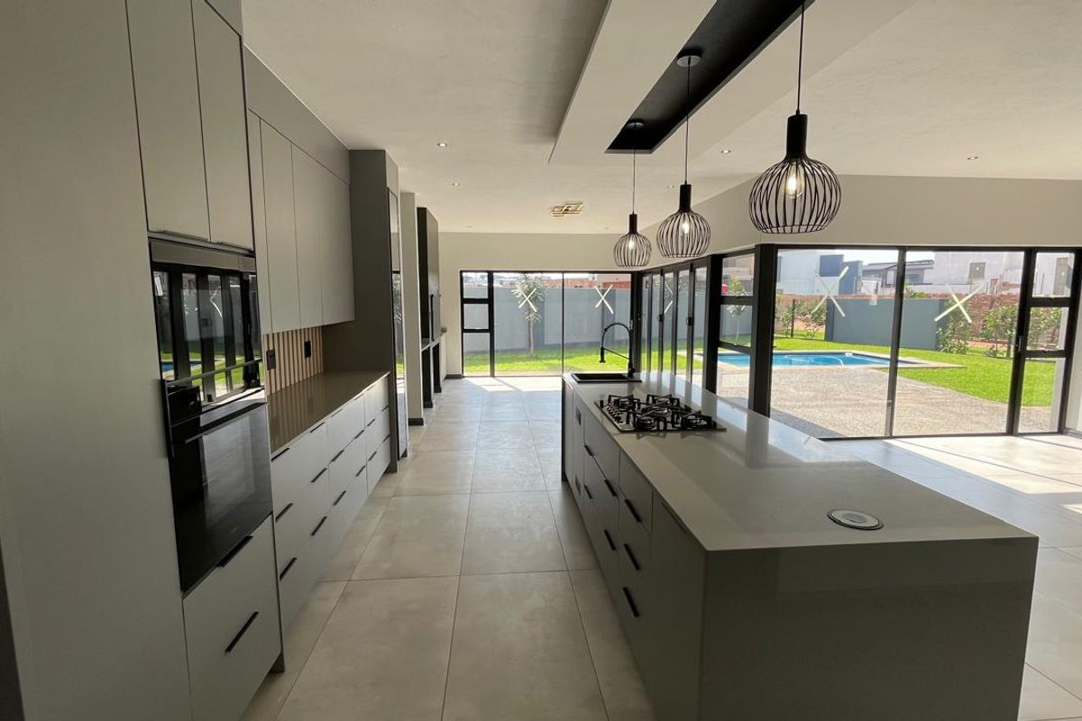 Contemporary 4 Bedroom Family Home | Covered Patio with Braai | Pool | Double Garage - Photo 2