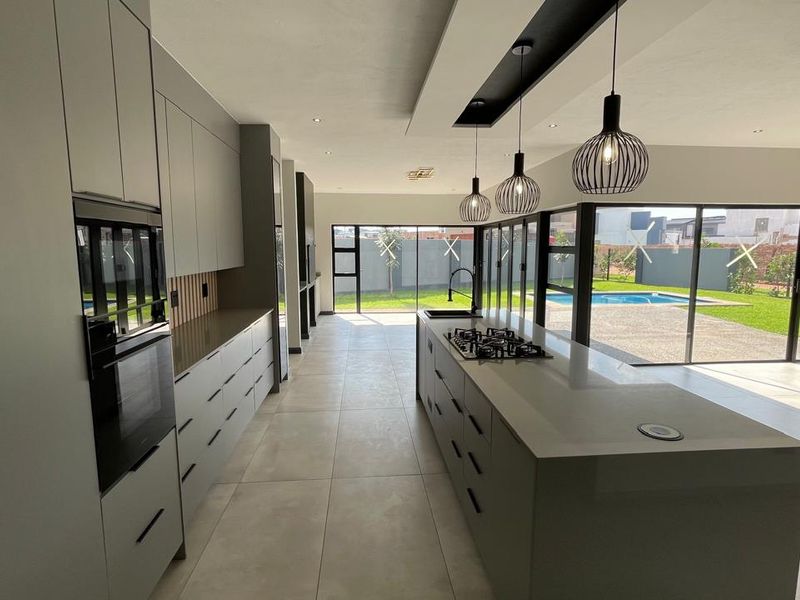 Contemporary 4 Bedroom Family Home | Covered Patio with Braai | Pool | Double Garage - Photo 2