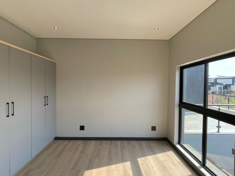 Contemporary 4 Bedroom Family Home | Covered Patio with Braai | Pool | Double Garage - Photo 8