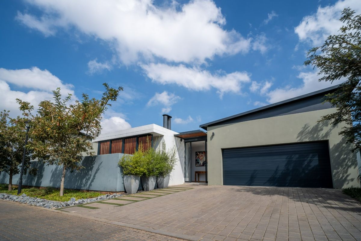Modern 4 Bedroom Home with Solar & Heated Pool in Secure Swallow Hills Estate - Photo 4
