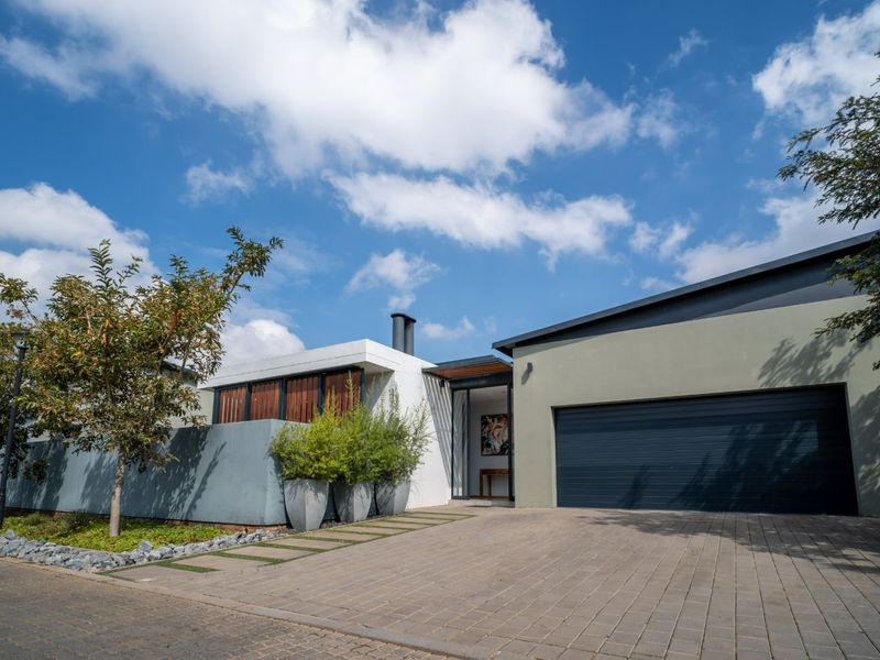 Modern 4 Bedroom Home with Solar & Heated Pool in Secure Swallow Hills Estate - Photo 4
