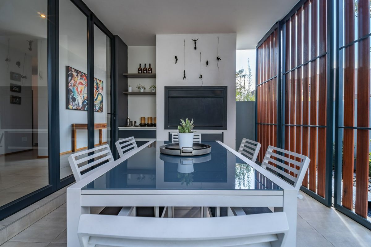 Modern 4 Bedroom Home with Solar & Heated Pool in Secure Swallow Hills Estate - Photo 2