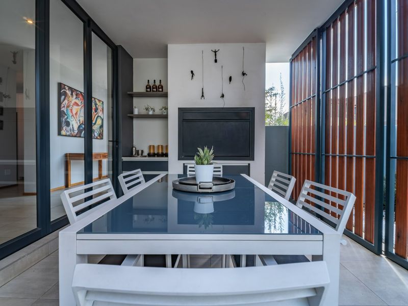 Modern 4 Bedroom Home with Solar & Heated Pool in Secure Swallow Hills Estate - Photo 2