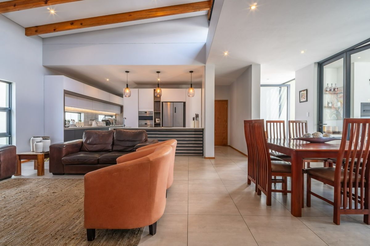 Modern 4 Bedroom Home with Solar & Heated Pool in Secure Swallow Hills Estate - Photo 5